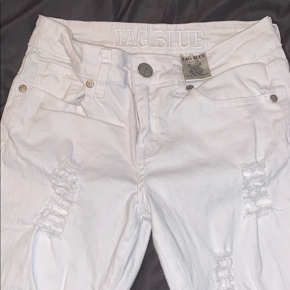 White ripped jeans